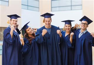 Group Of Smiling Students In Mortarboards