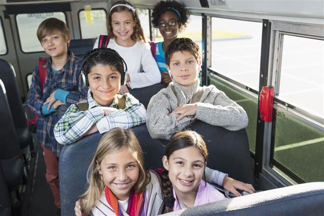 Children Riding School Bus
