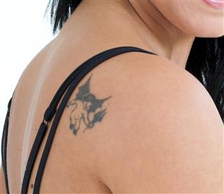 Angel tattoo on woman back