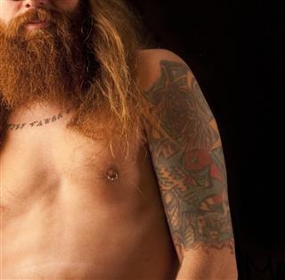 Bearded man with tattoo