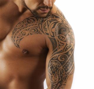 Man with polynesian tattoos