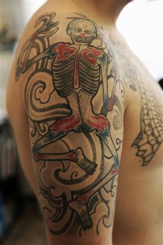 Art tattoo on male arm