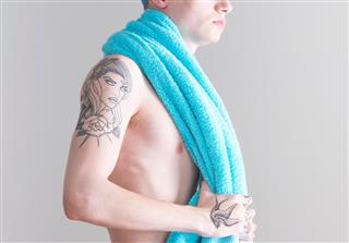 Young man with towel