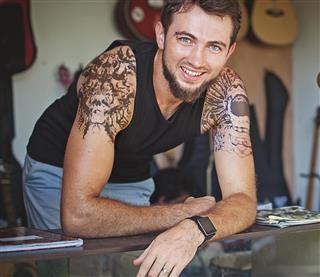 Handsome man with tattoo