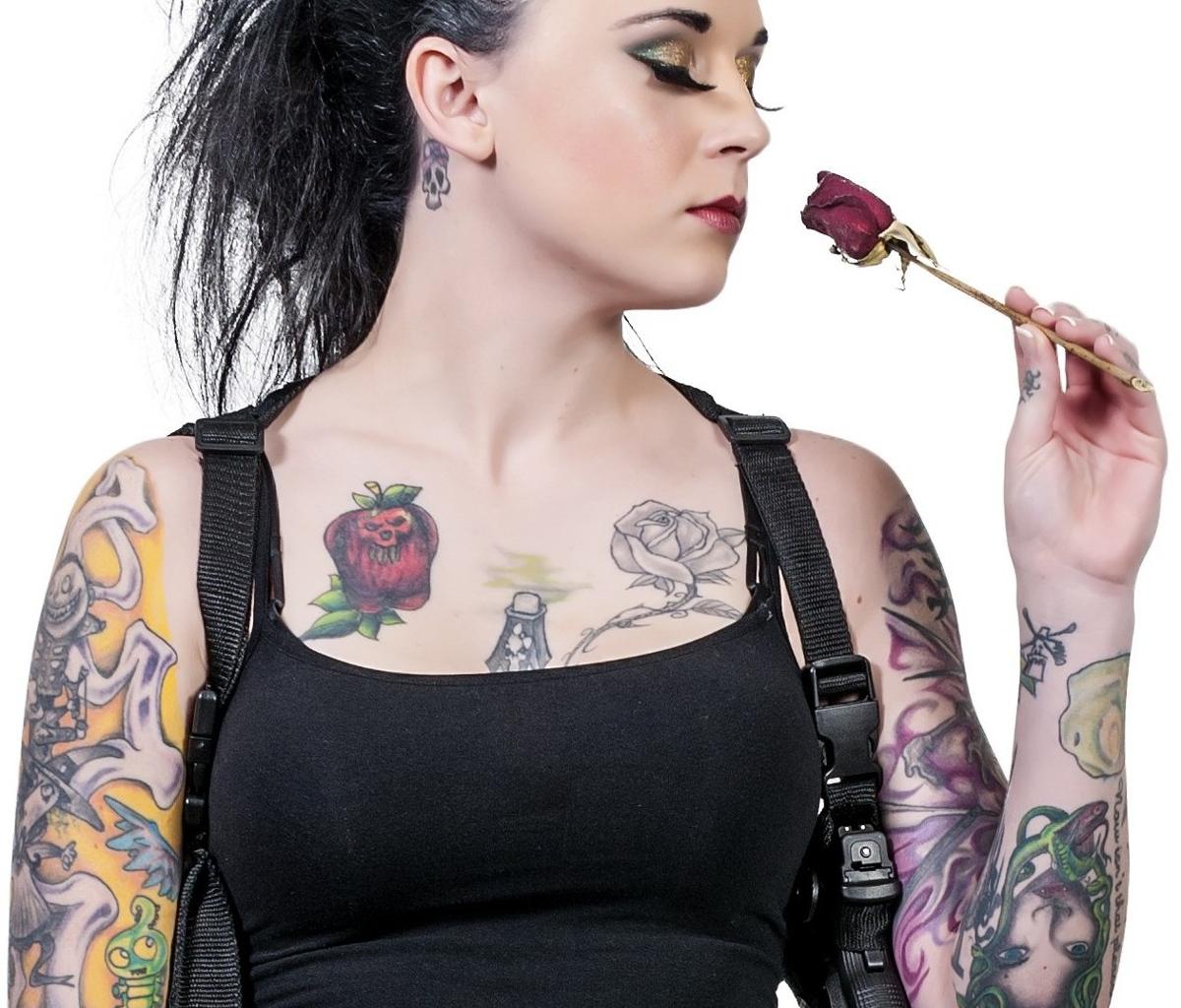 rose vine tattoos on arm