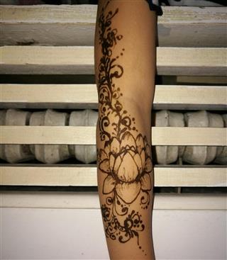 Henna lotus design tattoo