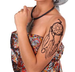 Henna tattoo on female arm