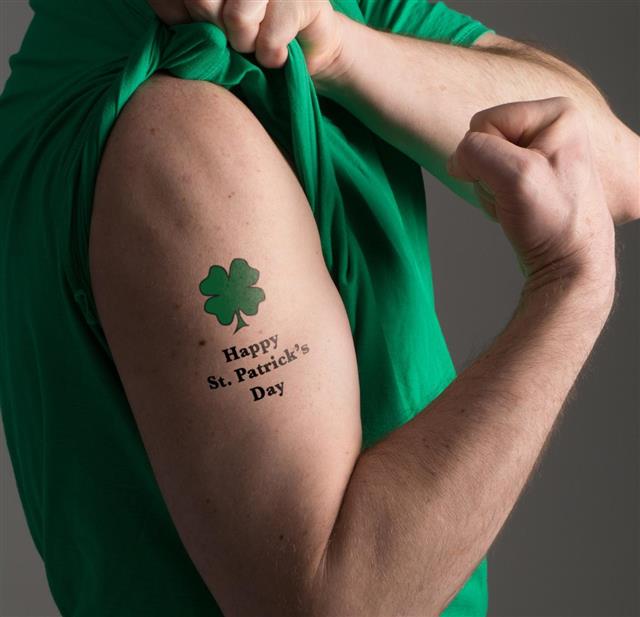 Man with clover tattoo