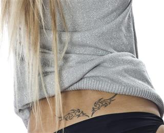 Sexy female back tattoo