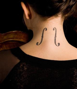 Tattoo on woman neck
