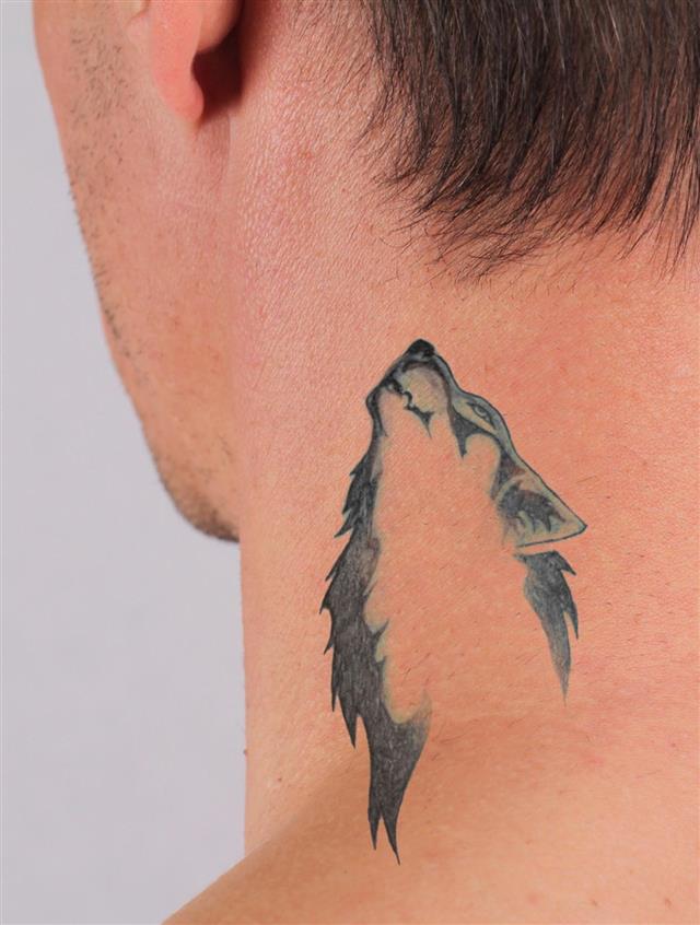 Wolf tattoo on neck