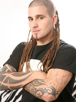 Pierced man with tattoo