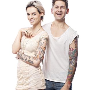 Smiling tattooed couple