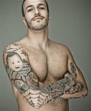 Muscular sexy man with tattoo