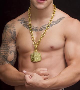 Tattooed man with necklace
