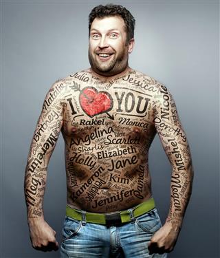 Man with love text tattoos