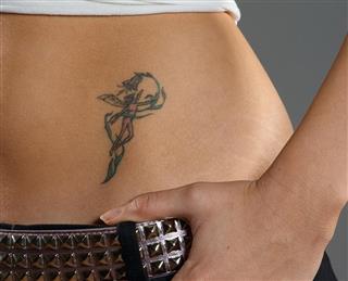 Tattoo on woman hip