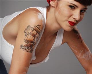 Tattoo on lady arm