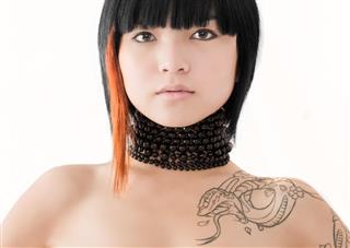 Beautiful girl with snake tattoo