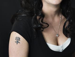 Tattoo symbol on arm