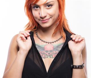 Tattoo girl with red hair