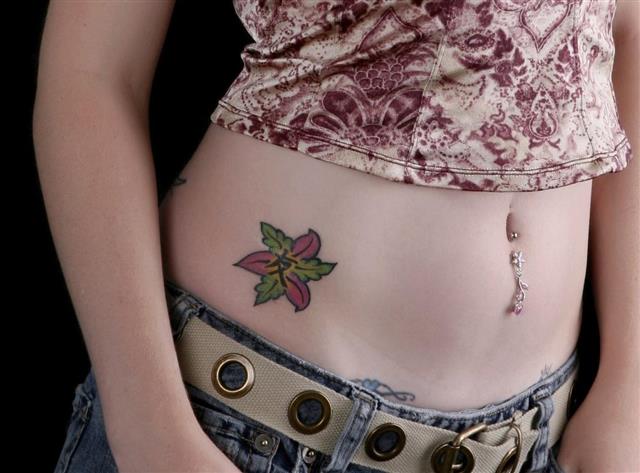Flower tattoo on female body