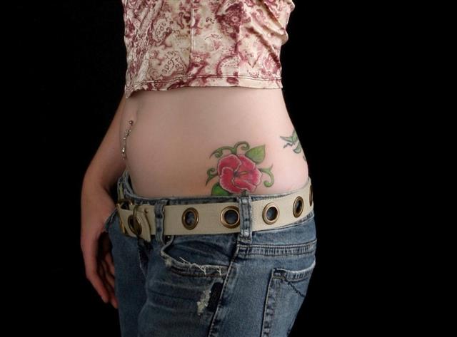 Flower tattoo on hip