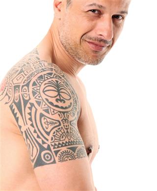 Man With Tattoo And Piercing