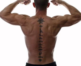 Muscled Back With Tattoo