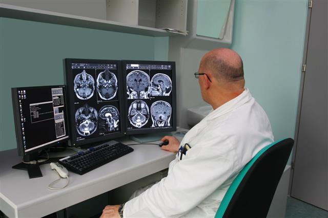 Radiologist Examining Mri Scans
