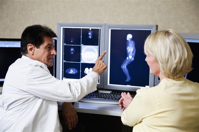 Doctor And Patient Discussing Medical Scans