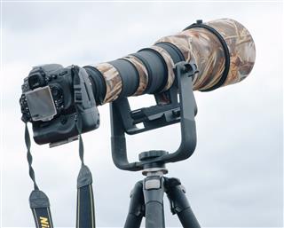 Nikon Dslr Camera With Large Lens