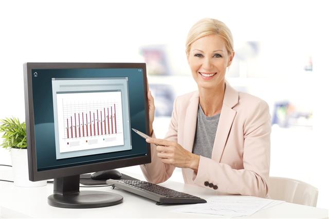 Lady Pointing At Computer