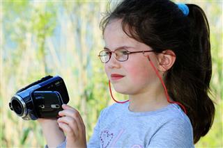 Little Girl Recording With Camera
