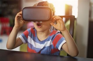 Boy Playing With Virtual Reality Headset