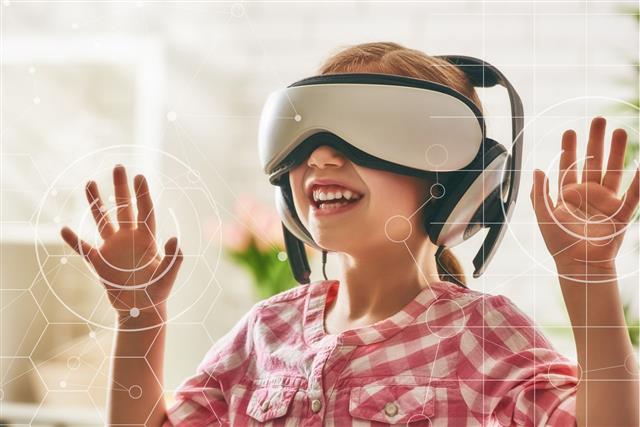 Girl Playing In Virtual Reality Glasses