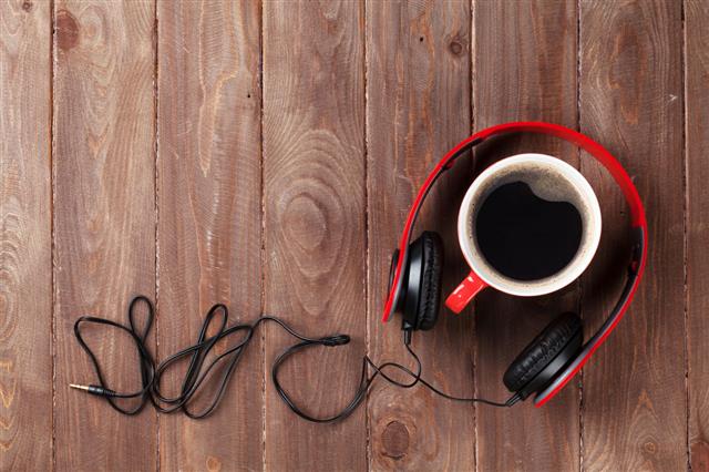 Headphones And Coffee Cup