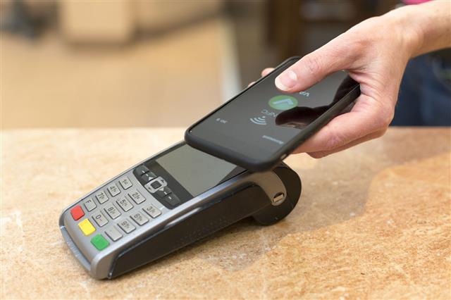 Customer Paying With Nfc Technology