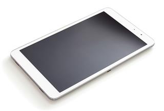 Digital Tablet On A White Table