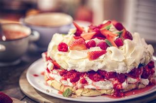 Delicious Berry Pavlova Cake with Strawberries and Raspberries