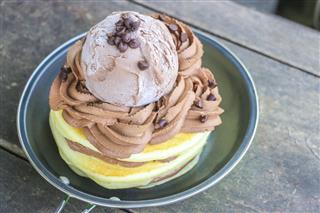 Stack of Homemade Pancakes with Chocolate Ice-Cream Scoops