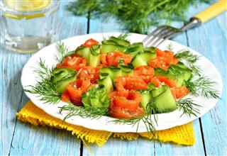 Homemade salted salmon with cucumber and dill