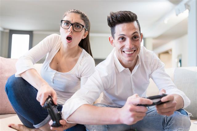 Couple playing videogames