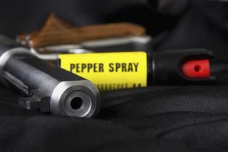 Handgun and Pepper Spray