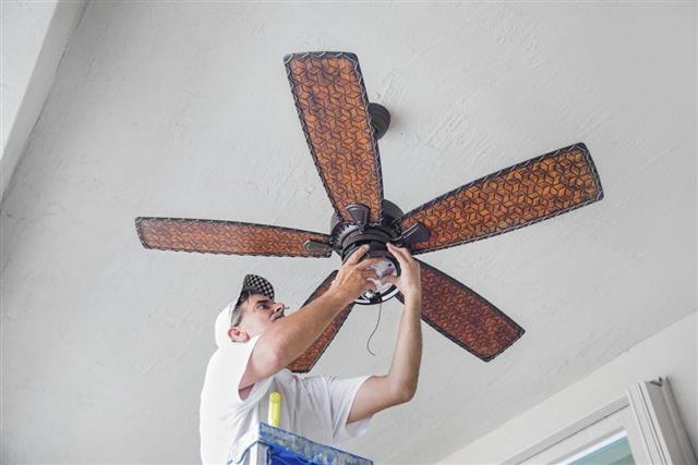 Real Electrician Hanging a Ceiling Fan rr