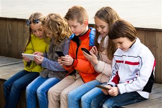 Children playing with mobile phone