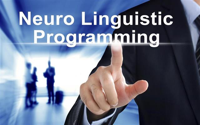 Businessman hand touching Neuro Linguistic Programming (or NLP)