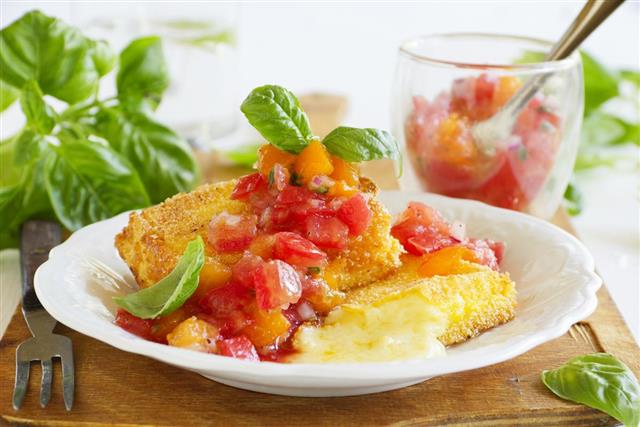 Fried brie with tomato salsa
