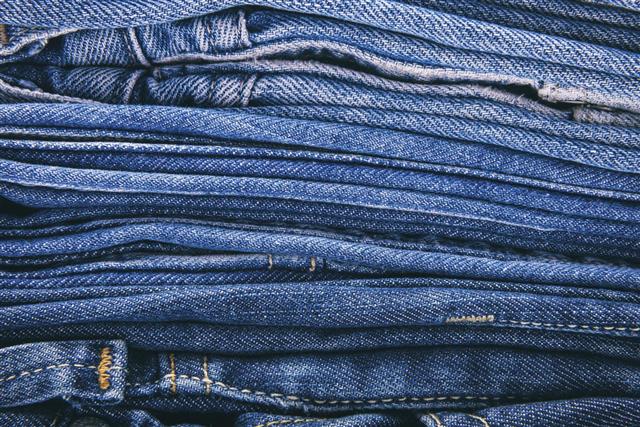 Piled-up blue jeans