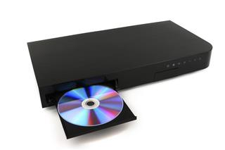 DVD CD disk insert to dvd player on white background